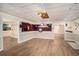Recreation room with billiard-themed decor and hardwood floors, offering an inviting space for games and leisure at 402 Clyde Ct, Mcdonough, GA 30252