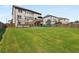 Sprawling backyard with lush green lawn, providing ample space for recreation and outdoor enjoyment at 5240 Bristlecone Pine Way, Cumming, GA 30040