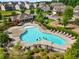 A community pool area with sun loungers, a playground, and a covered gathering space for residents at 5240 Bristlecone Pine Way, Cumming, GA 30040