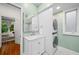 Charming bathroom with marble vanity and stackable washer/dryer at 582 Lakeshore Ne Dr, Atlanta, GA 30307
