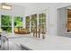 Bright kitchen island with marble countertops and stainless steel fixtures, offering a stylish workspace at 582 Lakeshore Ne Dr, Atlanta, GA 30307