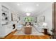 Bright living room features hardwood floors, built-in shelving, fireplace, and neutral decor at 582 Lakeshore Ne Dr, Atlanta, GA 30307