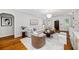 Bright living room features hardwood floors, stylish furniture, and neutral decor at 582 Lakeshore Ne Dr, Atlanta, GA 30307