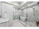 Beautifully designed main bathroom with soaking tub, shower and modern vanity at 582 Lakeshore Ne Dr, Atlanta, GA 30307