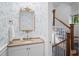 Charming powder room with blue toile wallpaper and decorative mirror at 582 Lakeshore Ne Dr, Atlanta, GA 30307