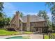 Spacious home with a swimming pool, covered patio, and large backyard perfect for entertaining at 6255 Hedgestone Way, Douglasville, GA 30135