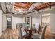 Partially finished basement with visible ceiling insulation and a dining table with seating at 6255 Hedgestone Way, Douglasville, GA 30135