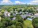 Aerial view of community, pool, common area, landscaping, and city skyline at 1468 Briarwood Ne Rd # 406, Brookhaven, GA 30319
