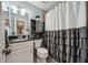 Charming bathroom featuring neutral color, decorative curtains, and vanity at 1468 Briarwood Ne Rd # 406, Brookhaven, GA 30319
