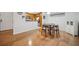 Bright dining area features hardwood floors and adjacent access to the kitchen at 1468 Briarwood Ne Rd # 406, Brookhaven, GA 30319