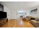 Bright, open living space featuring wood floors and a dining area view at 1468 Briarwood Ne Rd # 406, Brookhaven, GA 30319