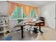 Bright home office featuring lots of natural light and an exercise bike at 1468 Briarwood Ne Rd # 406, Brookhaven, GA 30319