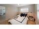Cozy bedroom with hardwood floors, shuttered windows, and neutral decor at 167 Garden Ln, Decatur, GA 30030