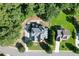 Expansive property featuring a well-maintained lawn, mature trees, and a circular driveway at 1777 Water Springs Way, Dacula, GA 30019