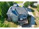 Beautiful backyard showcasing a large deck, mature trees, and a serene outdoor living space at 1777 Water Springs Way, Dacula, GA 30019