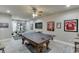 Fun game room with a ping pong table, television, and home gym equipment at 1777 Water Springs Way, Dacula, GA 30019