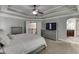 Spacious main bedroom with a bed, fireplace and an ensuite bathroom at 1777 Water Springs Way, Dacula, GA 30019