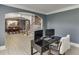 Inviting office area with stairs and dining room in the background at 1777 Water Springs Way, Dacula, GA 30019