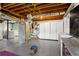 Partially finished basement featuring visible ductwork, water heater, and unfinished laundry area at 2416 Elmwood Se Cir, Atlanta, GA 30339