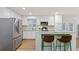 Bright kitchen with white cabinets, granite countertops and stainless steel appliances at 2416 Elmwood Se Cir, Atlanta, GA 30339