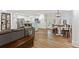 Spacious living area with a modern kitchen, a large sectional sofa, and a dining table at 2416 Elmwood Se Cir, Atlanta, GA 30339