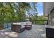 Relaxing deck with comfortable seating and wooded views, perfect for outdoor lounging at 2416 Elmwood Se Cir, Atlanta, GA 30339