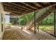 Exterior shot showing a deck with stairs leading to a gravel patio, extending the living space outdoors at 3710 Ridgefair Dr, Cumming, GA 30040