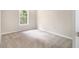 Bedroom with carpeted floors and a window at 3710 Ridgefair Dr, Cumming, GA 30040