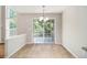 Bright breakfast nook with sliding glass doors leading to a wooden deck at 3710 Ridgefair Dr, Cumming, GA 30040