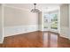 Bright dining room featuring a bay window, hardwood floors, and modern lighting at 3710 Ridgefair Dr, Cumming, GA 30040