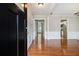 Inviting entryway with hardwood floors leading to a bright, spacious home at 3710 Ridgefair Dr, Cumming, GA 30040