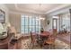 Cozy dining area with wood floors, shutters, and round table for intimate gatherings at 510 Independence Way, Roswell, GA 30075