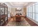 Elegant dining room with natural light, shutters, and stylish chandelier for memorable meals at 510 Independence Way, Roswell, GA 30075