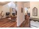Open concept living area with fireplace, built-ins, and hardwood flooring throughout at 510 Independence Way, Roswell, GA 30075