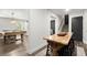 Basement area featuring a pool table, wooden table with stools, and stairs leading to another level at 5605 Miners Rdg, Cumming, GA 30028