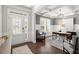 Bright home office with coffered ceiling, plantation shutters, neutral decor, and hardwood floors at 5605 Miners Rdg, Cumming, GA 30028