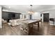 Finished basement includes pool table, comfy seating, and dark wood wall accents at 5605 Miners Rdg, Cumming, GA 30028