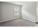 Bright bedroom with natural light, plush carpeting, and a large window at 1050 Chapman Circle Cir, Stone Mountain, GA 30088