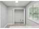 Pantry with shelving and tile flooring adjacent to a window at 1050 Chapman Circle Cir, Stone Mountain, GA 30088