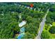 Aerial shot of home with community pool and tennis courts at 130 Hamilton Way, Roswell, GA 30075