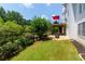 Spacious backyard patio and firepit area with a deck above at 130 Hamilton Way, Roswell, GA 30075