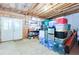 Unfinished basement area with tools, storage containers, and water jugs at 130 Hamilton Way, Roswell, GA 30075