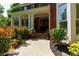 Inviting entrance with manicured landscaping leading to the front door at 130 Hamilton Way, Roswell, GA 30075