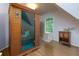 Home sauna room featuring a glass door sauna, wooden floors and a bright window at 130 Hamilton Way, Roswell, GA 30075