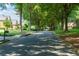 Quiet residential street with mature trees and well-kept homes at 130 Hamilton Way, Roswell, GA 30075