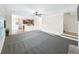 Bright living room open to the kitchen, perfect for entertaining, with plenty of natural light at 1525 Lake Dow Rd, Mcdonough, GA 30252