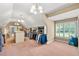 Spacious walk-in closet with custom shelving, center island and large window at 2317 Whiting Bay Courts Nw, Kennesaw, GA 30152