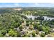 Overhead view of the homes in the neighborhood surrounding a beautiful lake at 2979 Overwood Sw Ln, Snellville, GA 30078