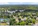 Overhead view of the homes in the neighborhood surrounding a beautiful lake, with inset of home at 2979 Overwood Sw Ln, Snellville, GA 30078