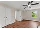 Bedroom featuring hardwood floors, natural light, and neutral wall color at 2979 Overwood Sw Ln, Snellville, GA 30078